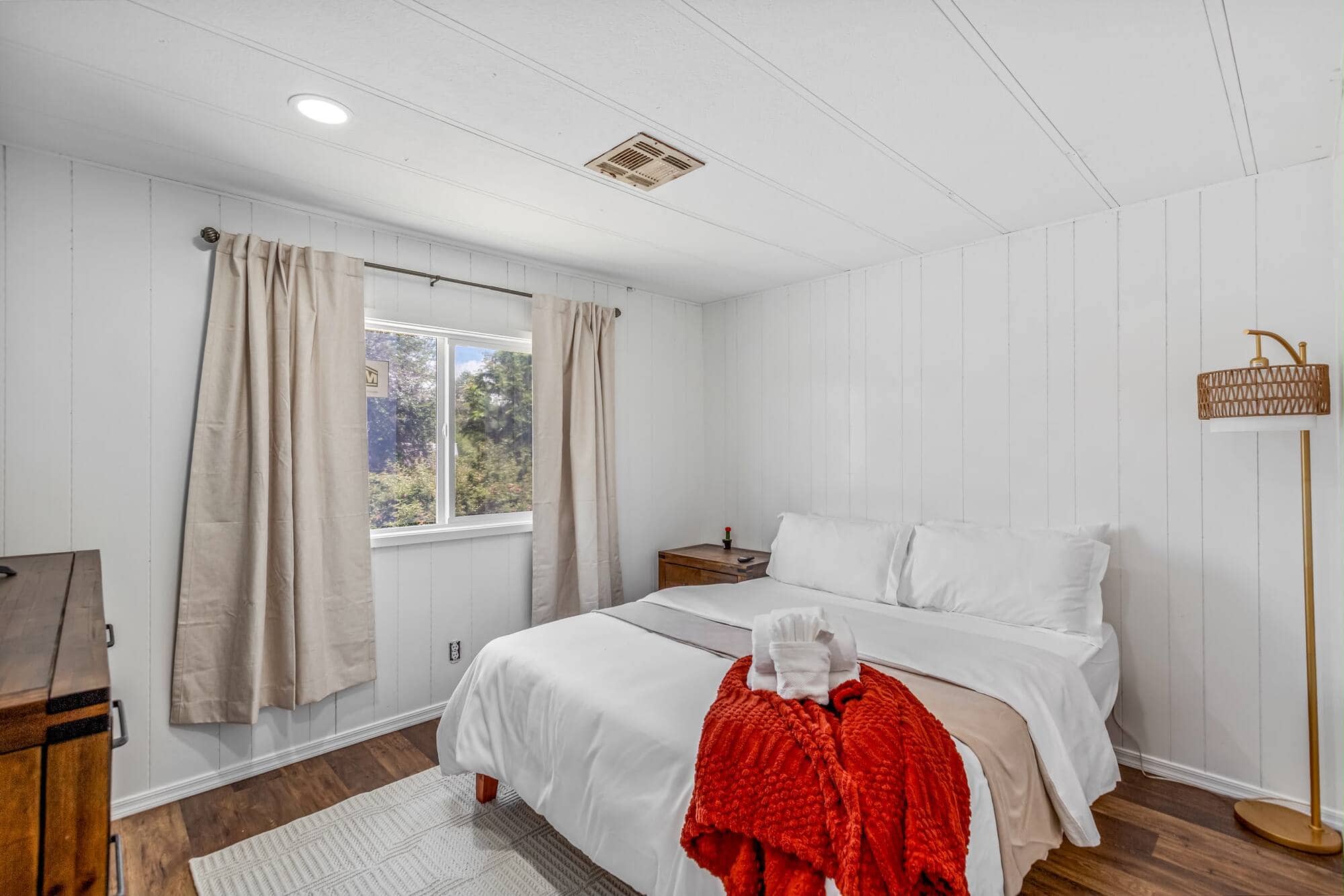 An empty, freshly cleaned home with bright windows and clean floors, ready to move into